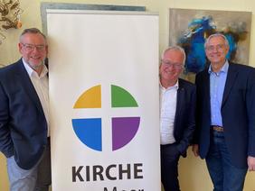 Kreispfarrer Christian Scheuer, Oberkirchenrat Udo Heinen und Pfarrer Dr. Stefan Welz